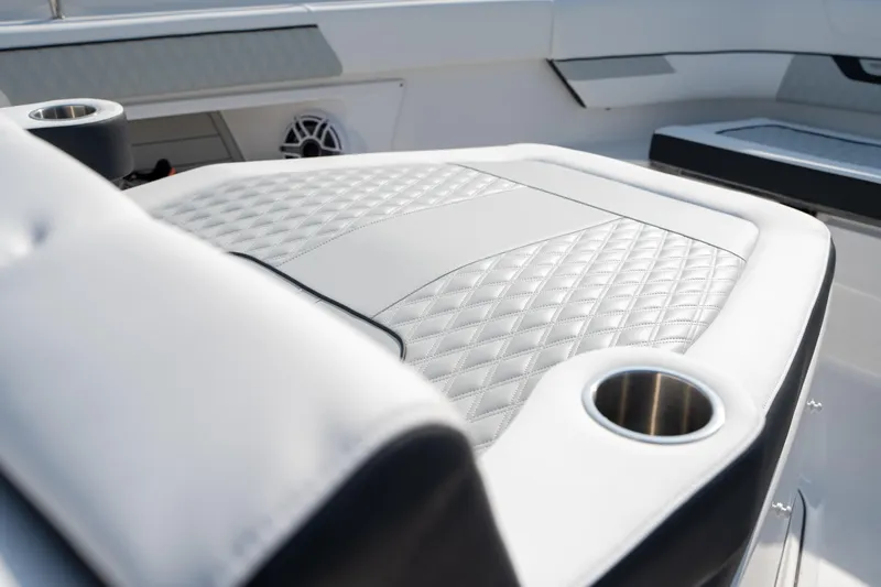  Yacht Photos Pics Luxurious seating on 2024 Blackfin 400 CC boat with diamond-stitched upholstery and cup holders.