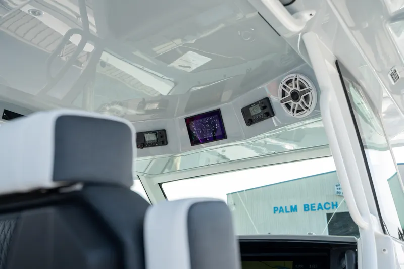  Yacht Photos Pics 2024 Blackfin 400 CC boat interior with advanced controls and speaker system.