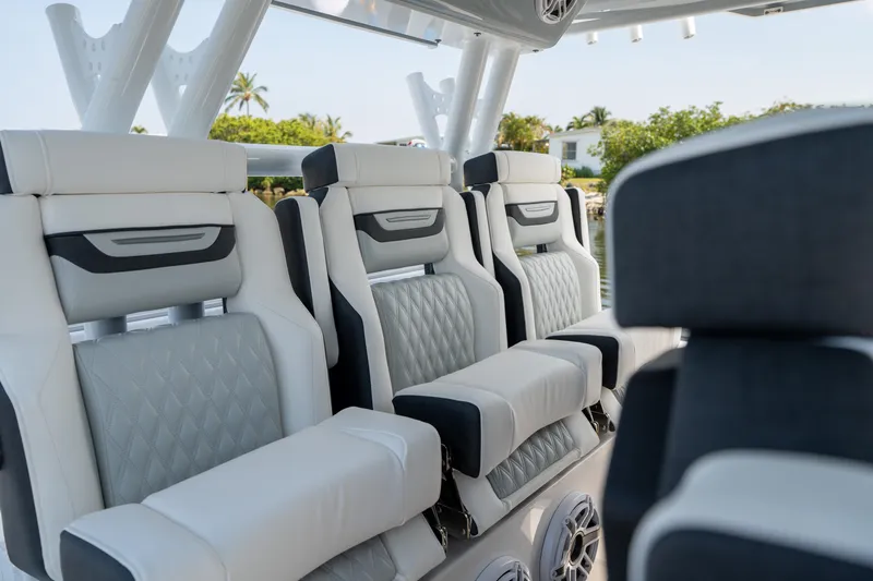  Yacht Photos Pics 2024 Blackfin 400 CC boat interior with luxurious seating and modern design.