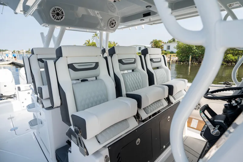  Yacht Photos Pics 2024 Blackfin 400 CC boat interior with luxurious seating and modern design.