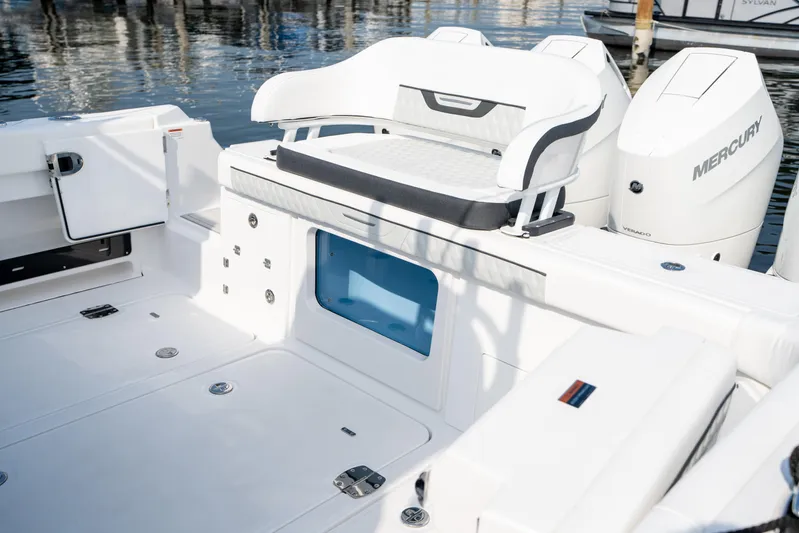  Yacht Photos Pics 2024 Blackfin 400 CC boat deck with seating and Mercury engines.