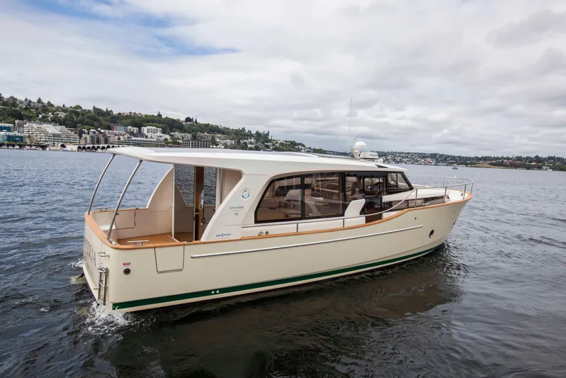 Soteria Yacht Photos Pics 2017 Greenline 40 Hybrid Diesel/Electric Yacht cruising on a calm lake.