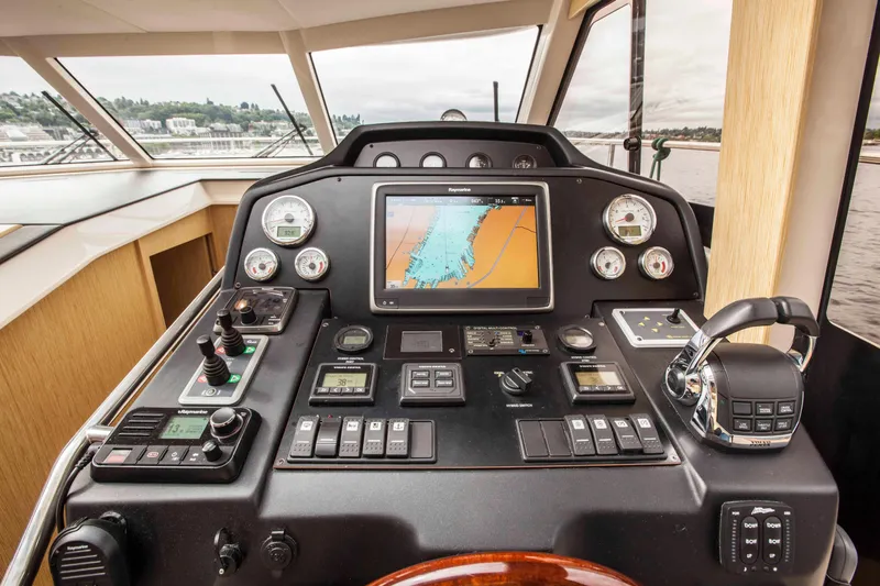 Soteria Yacht Photos Pics Control panel of 2017 Greenline 40 Hybrid Yacht with navigation screen and instruments.