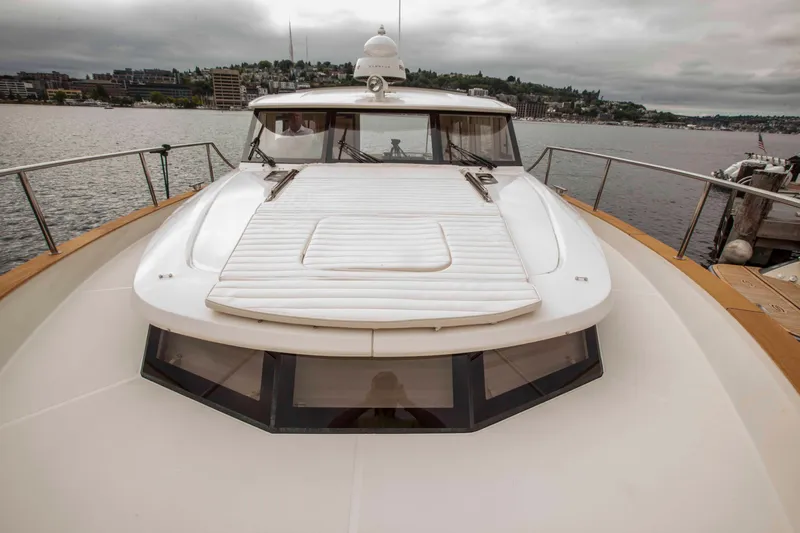 Soteria Yacht Photos Pics 2017 Greenline 40 Hybrid Diesel/Electric Yacht on calm water, showcasing sleek design.