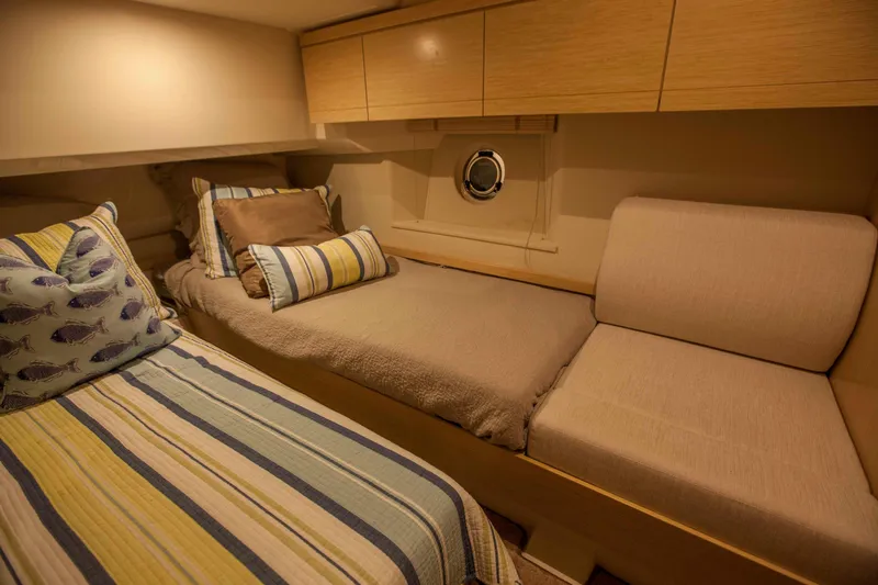 Soteria Yacht Photos Pics 2017 Greenline 40 Hybrid Yacht cabin with cozy twin beds and striped bedding.