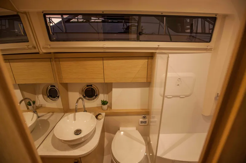 Soteria Yacht Photos Pics Luxurious bathroom in 2017 Greenline 40 Hybrid Diesel/Electric Yacht with modern fixtures.