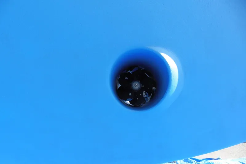 Kokomo Yacht Photos Pics Close-up of Ocean Alexander 426 Classico Sedan 1997 boat thruster in blue hull.