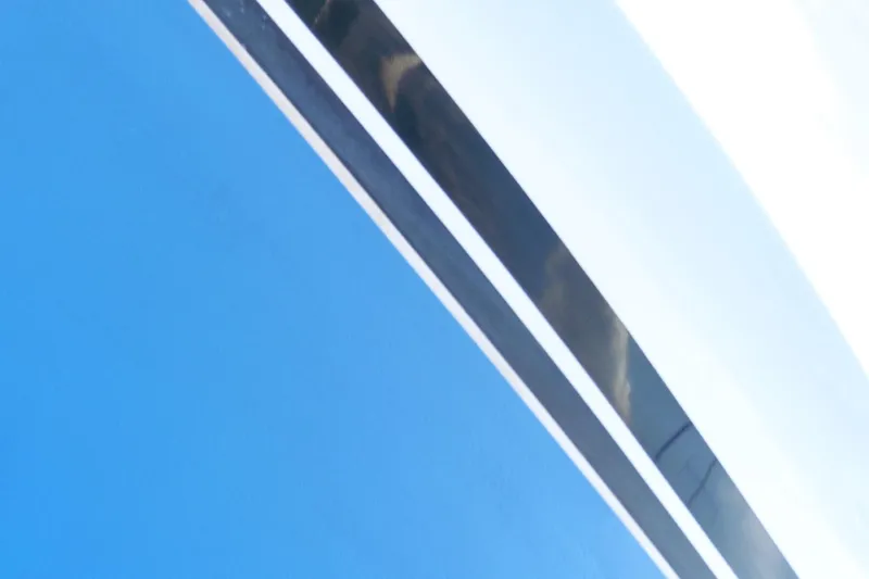 Kokomo Yacht Photos Pics Close-up of Ocean Alexander 426 Classico Sedan yacht, 1997, featuring sleek blue and white design.