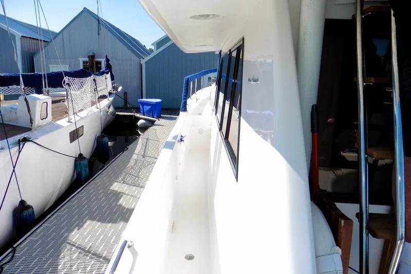 Kokomo Yacht Photos Pics Ocean Alexander 423 Classico yacht docked at marina, side view, 2000 model.