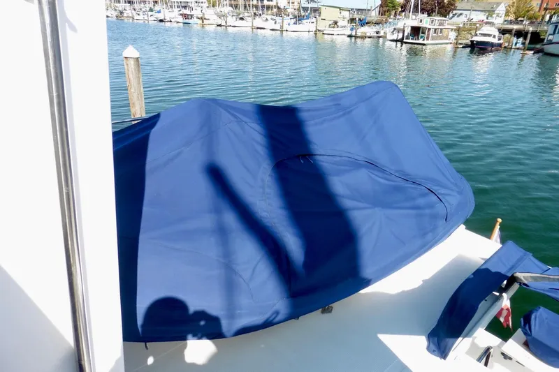 Kokomo Yacht Photos Pics Covered Ocean Alexander 423 Classico yacht, 2000 model, docked at a marina.