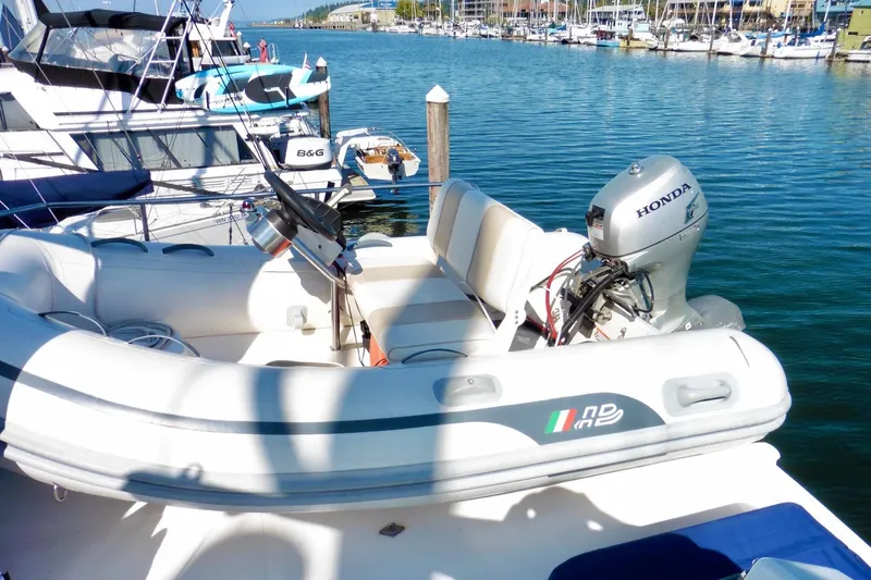 Kokomo Yacht Photos Pics Inflatable boat with Honda motor docked near Ocean Alexander 423 Classico, 2000 model.