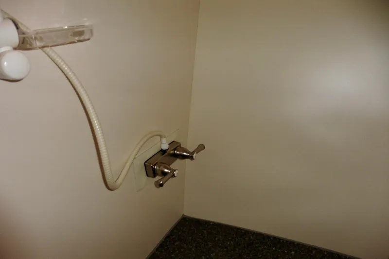 Kokomo Yacht Photos Pics Shower controls in 2000 Ocean Alexander 423 Classico yacht bathroom.