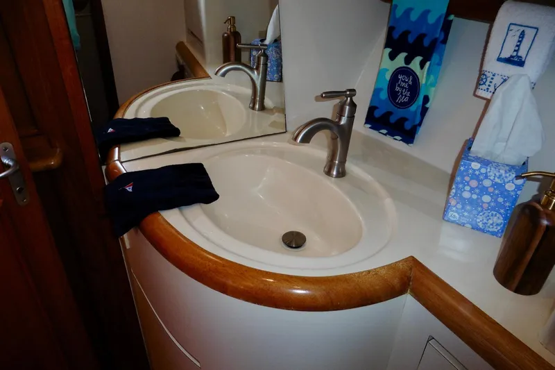 Kokomo Yacht Photos Pics Bathroom sink area on a 2000 Ocean Alexander 423 Classico yacht.