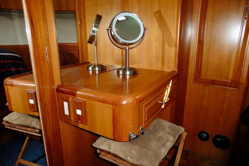 Kokomo Yacht Photos Pics Interior of 2000 Ocean Alexander 423 Classico yacht with wooden vanity and mirror.