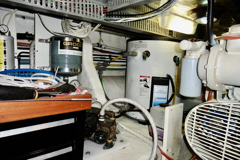 Kokomo Yacht Photos Pics Engine room of 2000 Ocean Alexander 423 Classico with marine equipment and wiring.