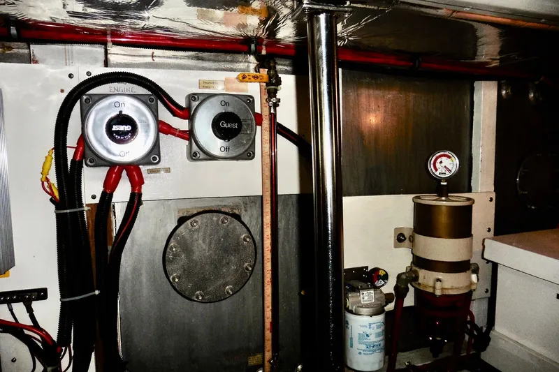 Kokomo Yacht Photos Pics Engine room of 2000 Ocean Alexander 423 Classico with switches and gauges.