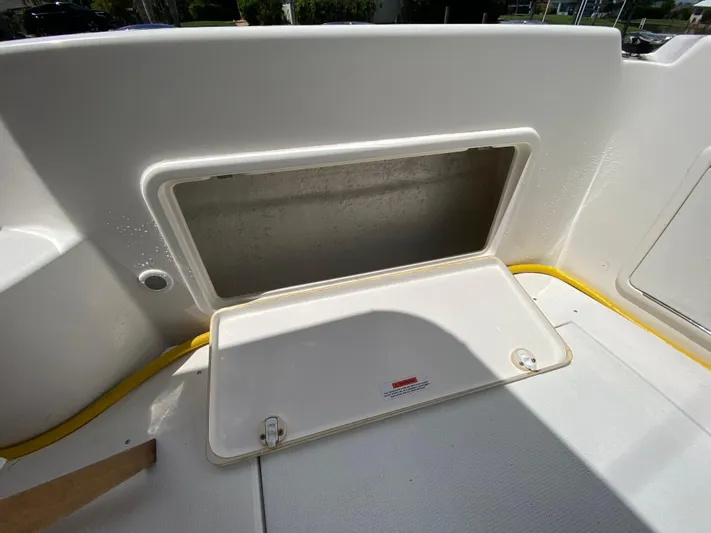 Pretty Fine Yacht Photos Pics Open storage compartment on 2003 Riviera 47 Convertible boat deck.