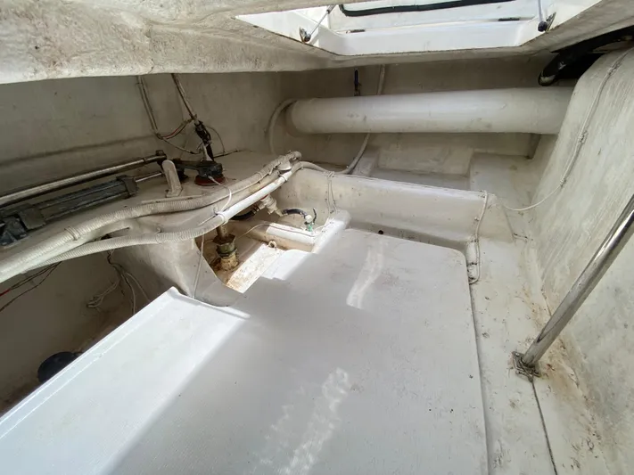 Pretty Fine Yacht Photos Pics 2003 Riviera 47 Convertible boat interior, showcasing wiring and structural components.
