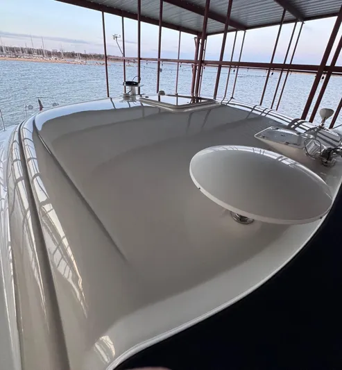 Lucky 9 Yacht Photos Pics 2007 Sea Ray 38 Sundancer yacht docked, showcasing sleek deck design and waterfront view.