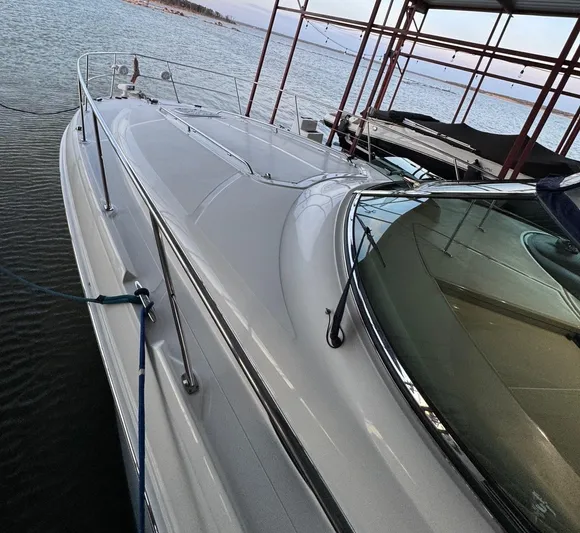 Lucky 9 Yacht Photos Pics 2007 Sea Ray 38 Sundancer yacht docked by the water.