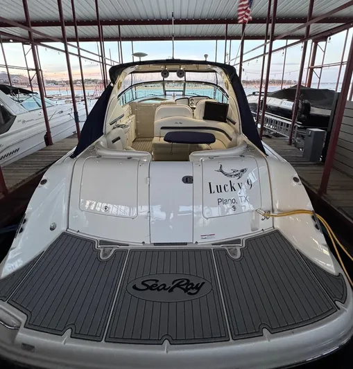 Lucky 9 Yacht Photos Pics 2007 Sea Ray 38 Sundancer docked, rear view with seating and deck, "Lucky" from Plano, TX.