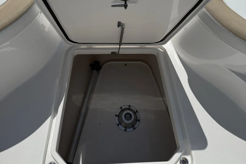  Yacht Photos Pics Open storage compartment on a 2017 Edgewater 320CC boat.