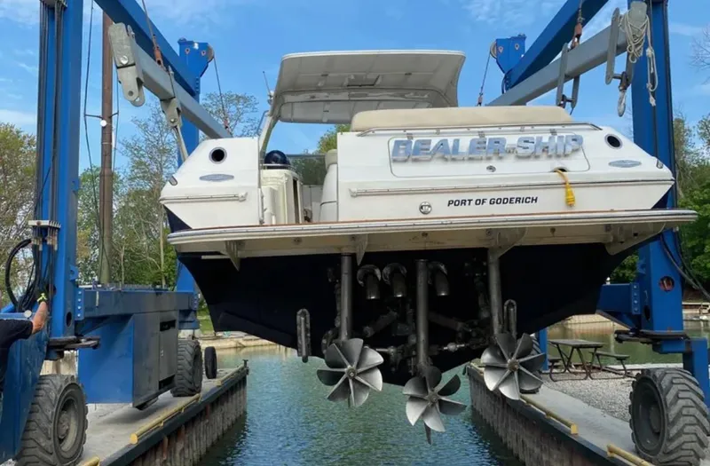 Dealer-ship Yacht Photos Pics 2004 Fountain 48 Express Cruiser being lifted at Port of Goderich.