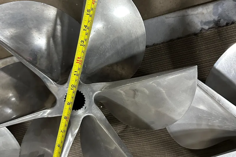 Dealer-ship Yacht Photos Pics Close-up of a boat propeller with measuring tape, Fountain 48 Express Cruiser, 2004 model.