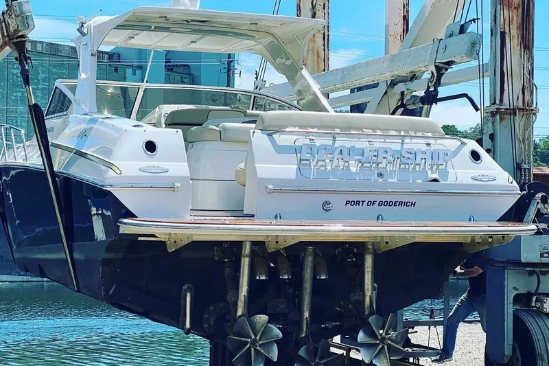 Dealer-ship Yacht Photos Pics 2004 Fountain 48 Express Cruiser yacht at Port of Goderich, elevated for maintenance.