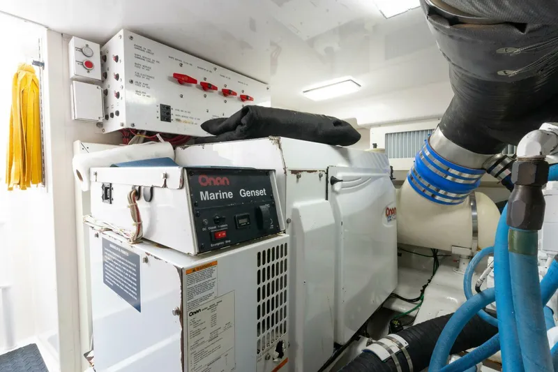 Wig Wag Yacht Photos Pics Engine room of a 2009 Viking 45 Open yacht with Onan Marine Genset.
