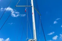 Sailboat mast of 2022 Nautitech 40 Open against clear blue sky.