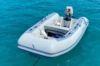 Inflatable dinghy on clear blue water, associated with Nautitech 40 Open 2022.