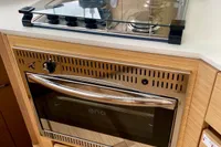 Modern kitchen in 2022 Nautitech 40 Open yacht with stove and oven.