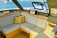 Luxurious interior of 2022 Nautitech 40 Open yacht with cozy seating and ocean view.