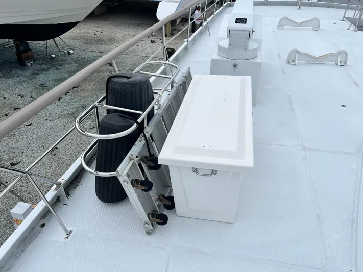 Ain't No Big Thing Yacht Photos Pics Deck of 1988 Custom Steel Motor Yacht with storage box and railing.