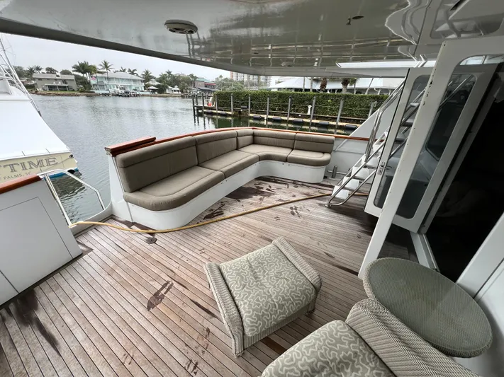 Ain't No Big Thing Yacht Photos Pics Spacious deck of 1988 Custom Steel Motor Yacht with comfortable seating and waterfront view.