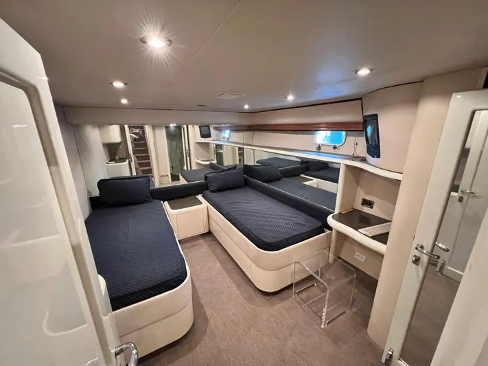 Ain't No Big Thing Yacht Photos Pics Luxurious cabin interior of a 1988 Custom Steel Motor Yacht with modern furnishings.