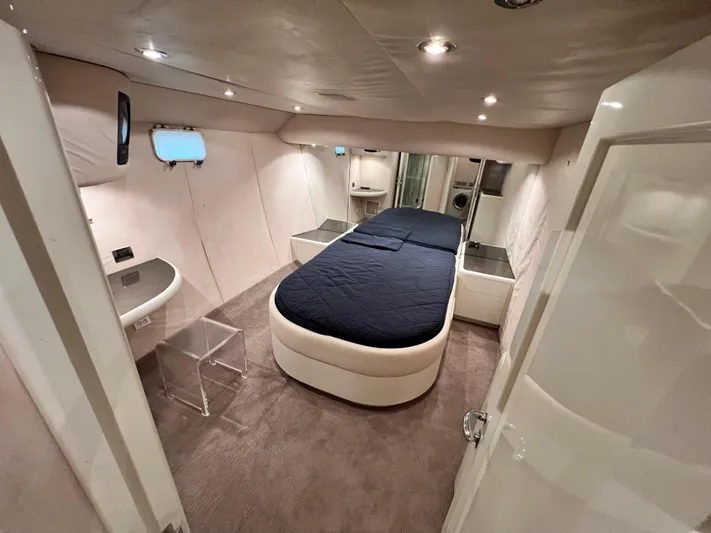 Ain't No Big Thing Yacht Photos Pics Luxurious interior of 1988 Custom Steel Motor Yacht with modern furnishings and elegant lighting.