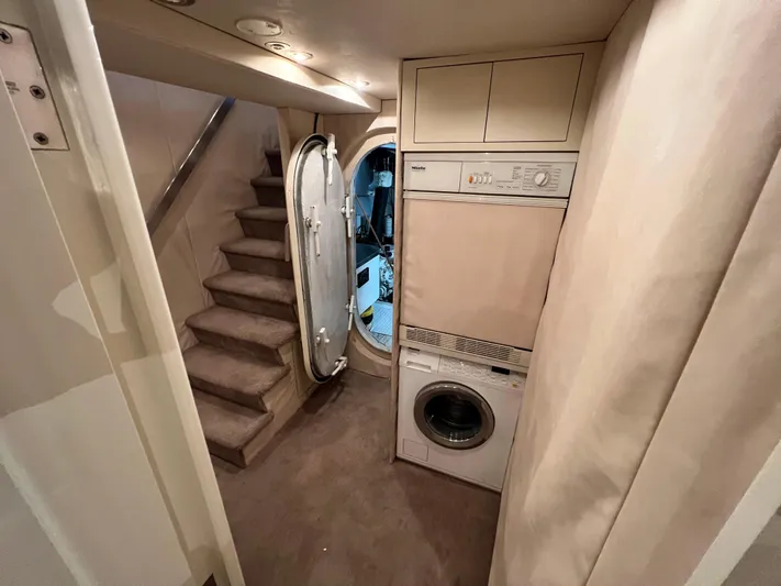 Ain't No Big Thing Yacht Photos Pics Interior of 1988 Custom Steel Motor Yacht with stairs, hatch, and laundry appliances.