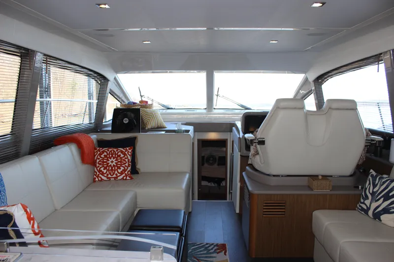  Yacht Photos Pics Luxurious interior of 2017 Sea Ray Fly 460 yacht with modern seating and helm.