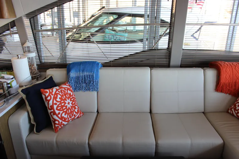  Yacht Photos Pics Interior of 2017 Sea Ray Fly 460 yacht with stylish cushions and modern decor.