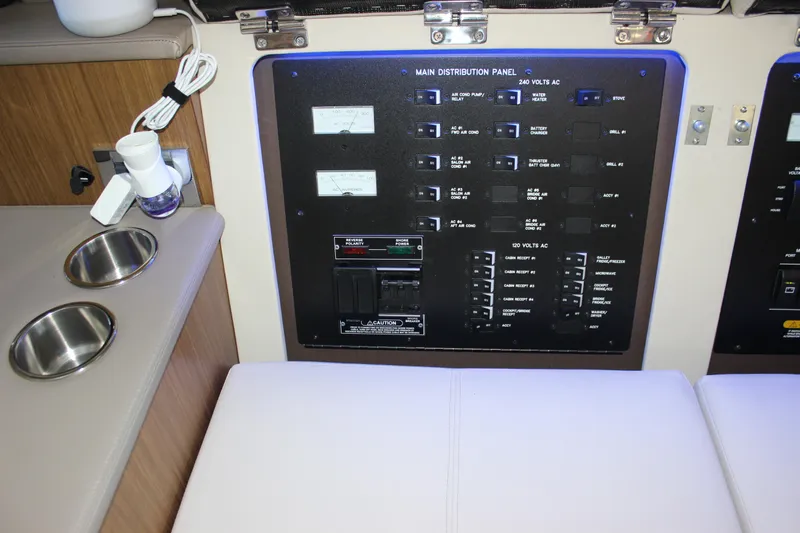  Yacht Photos Pics Main distribution panel on 2017 Sea Ray Fly 460 yacht, featuring control switches and gauges.