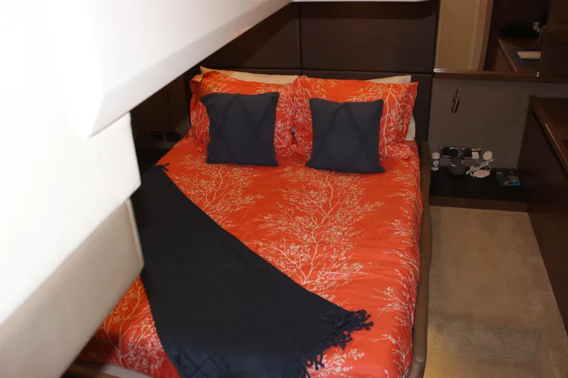  Yacht Photos Pics Luxurious bedroom in 2017 Sea Ray Fly 460 yacht with vibrant bedding and modern decor.