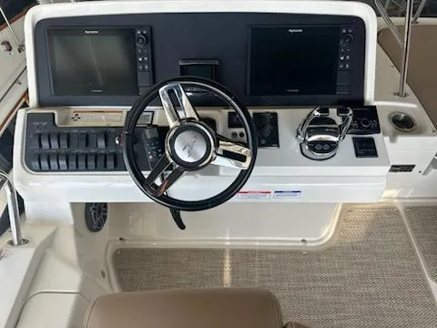  Yacht Photos Pics 2017 Sea Ray Fly 460 helm with dual displays and modern controls.