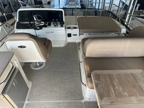  Yacht Photos Pics Interior of 2017 Sea Ray Fly 460 yacht with helm, seating, and table.