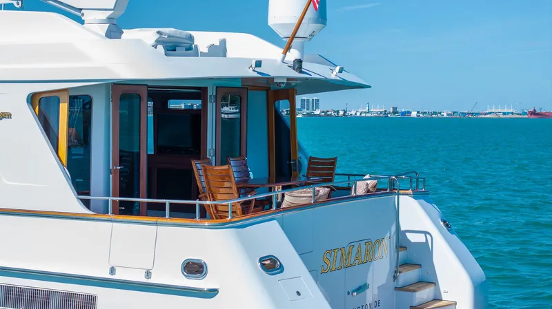  Yacht Photos Pics Luxury yacht "Sinaloa" on blue water, Burger 85 Deck house, 1999 model.