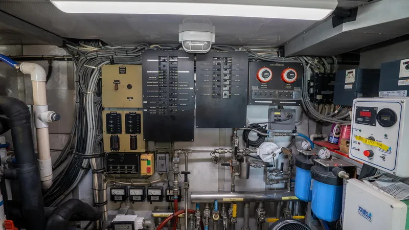  Yacht Photos Pics Electrical control panel in a 1999 Burger 85 Deck house yacht engine room.