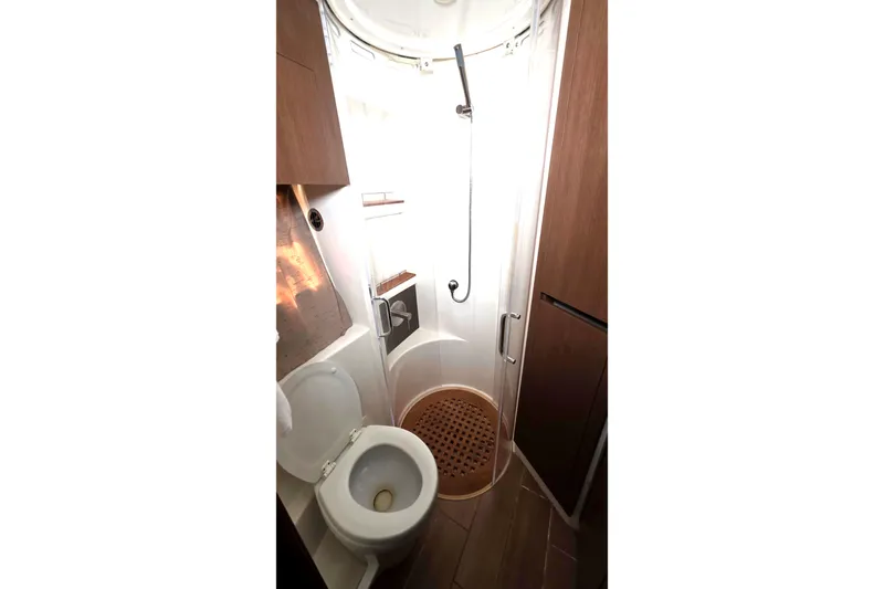  Yacht Photos Pics Bathroom interior of 2016 Sea Ray Sundancer 400 yacht with shower and toilet.