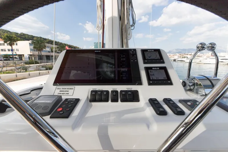 Twin Joy Yacht Photos Pics Helm of 2019 Lagoon 50 catamaran with navigation instruments and controls.