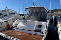 2020 Fairline Targa 48 Open yacht docked at marina, rear view.